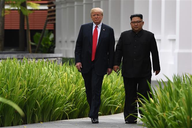 Description: http://image.baoangiang.com.vn/fckeditor/upload/2019/20190215/images/trumpkim(1).jpg