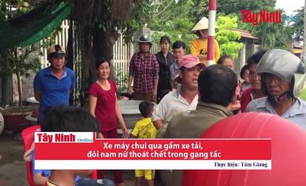 Xe máy chui qua gầm xe tải, đôi nam nữ thoát chết trong gang tấc
