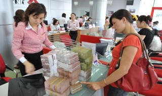 Báo chí quốc tế khen Việt Nam giảm lãi suất