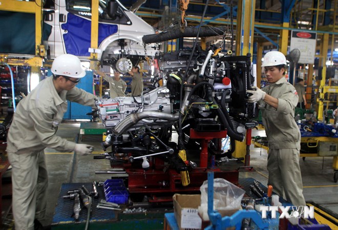 ắp ráp xe ôtô tại nhà máy ôtô Ford Hải Dương. (Ảnh: Trần Việt/TTXVN)