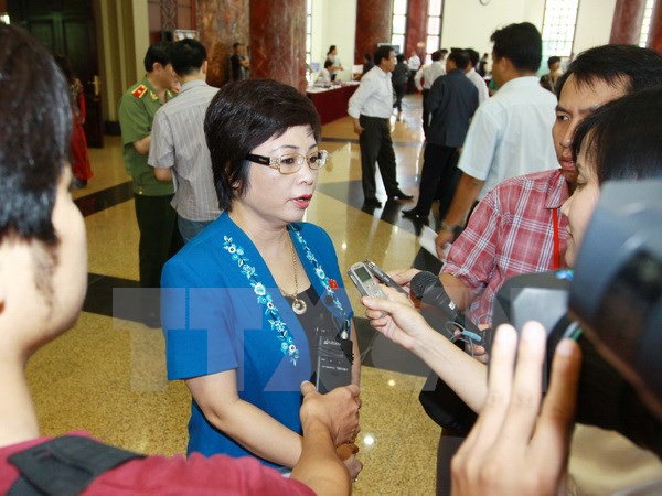 Bà Châu Thị Thu Nga trả lời phỏng vấn của báo chí tháng 6/2013. (Ảnh: Doãn Tấn/TTXVN)