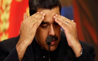 Venezuela rơi vào trạng thái vỡ nợ