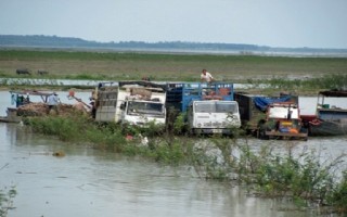 Yêu cầu hộ dân canh tác trên đất bán ngập bàn giao mặt bằng