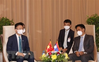 Bộ trưởng Bộ Tư pháp Lê Thành Long gặp Bộ trưởng Bộ Tư pháp Lào